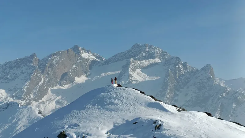 Himalayan mountain ridge with climbers